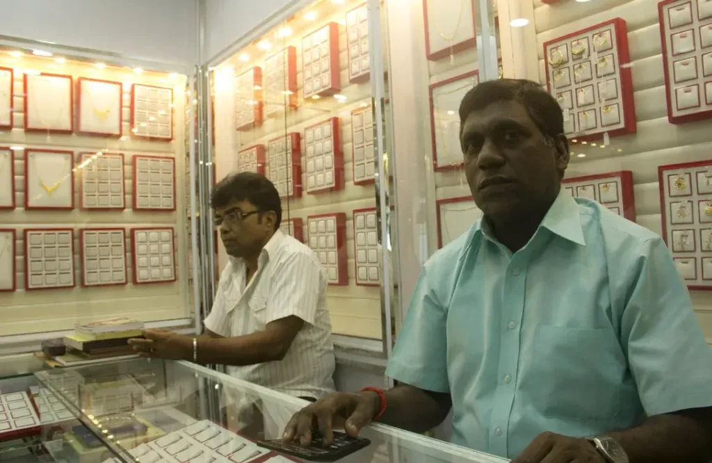 Gold vendors inside a brightly lit shop
