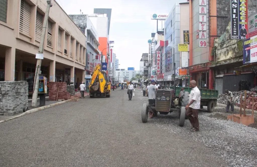 Tarmac being laid on a street