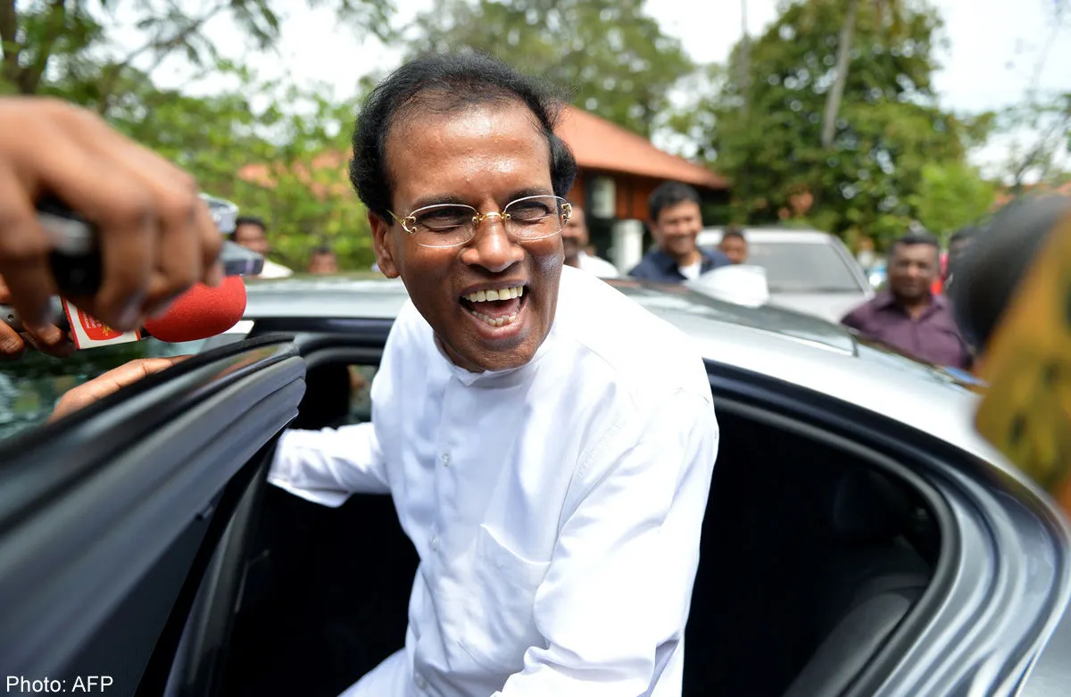 Sri Lankan President Maithripala Sirisena getting into a car