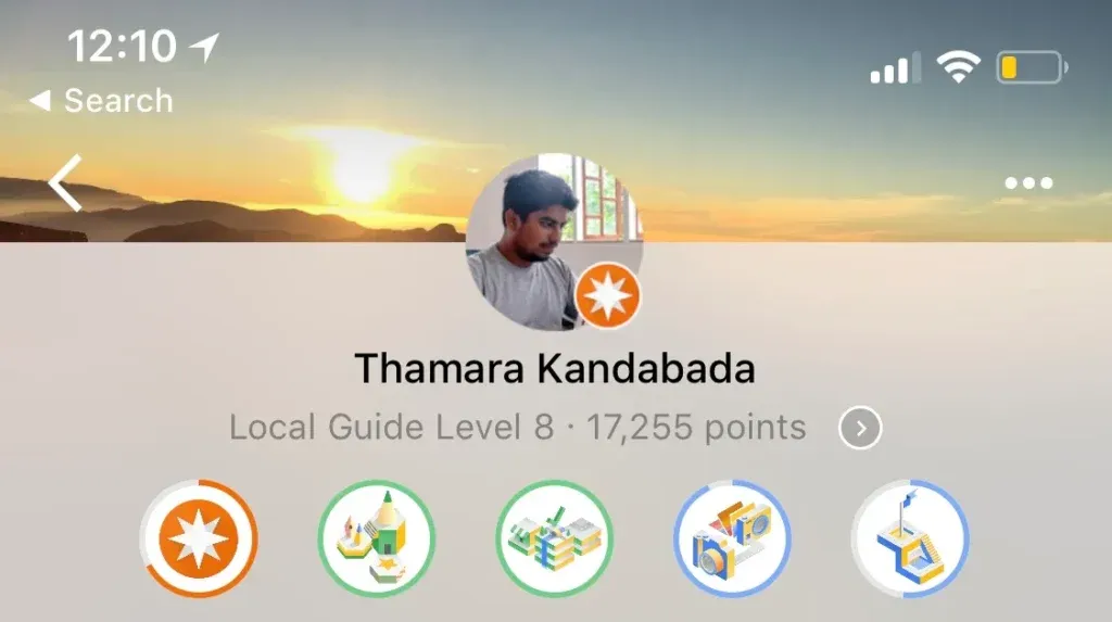 My Google Local Guides profile which displays my level, points, and the badges I’ve earned