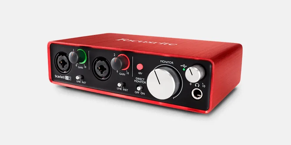 A 2i2 audio interface, with a red casing