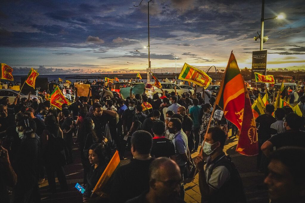 Protestors gathered at the Galle Face Green waving Sri Lankan flags
