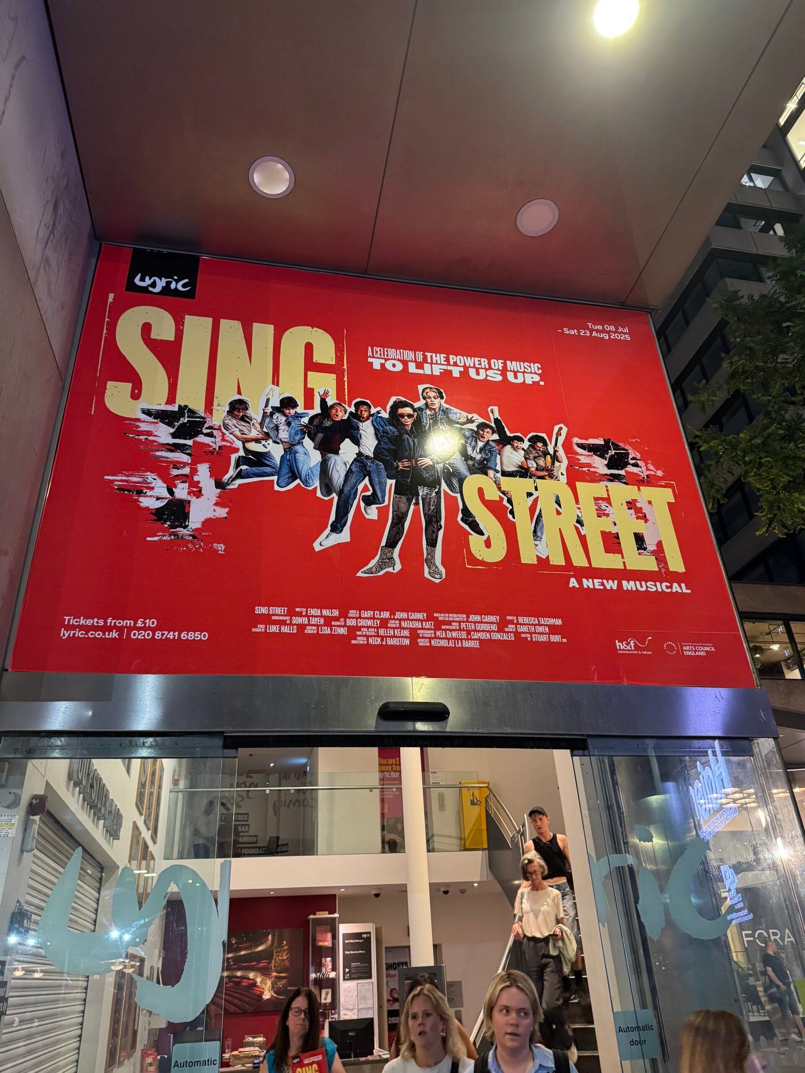 A large poster of Sing Street at the entrance to the theatre