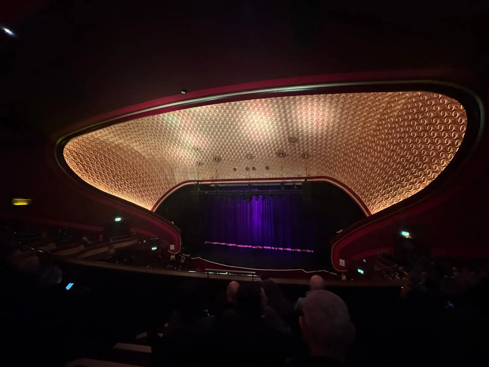 The O2 Apollo stage with a large curved lighting rig on top of it