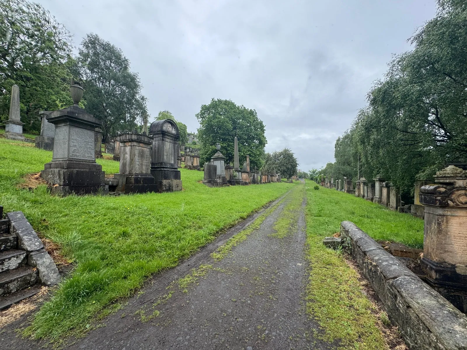 A pathway that leads through the necropolis, lined by monuments on both sides of it