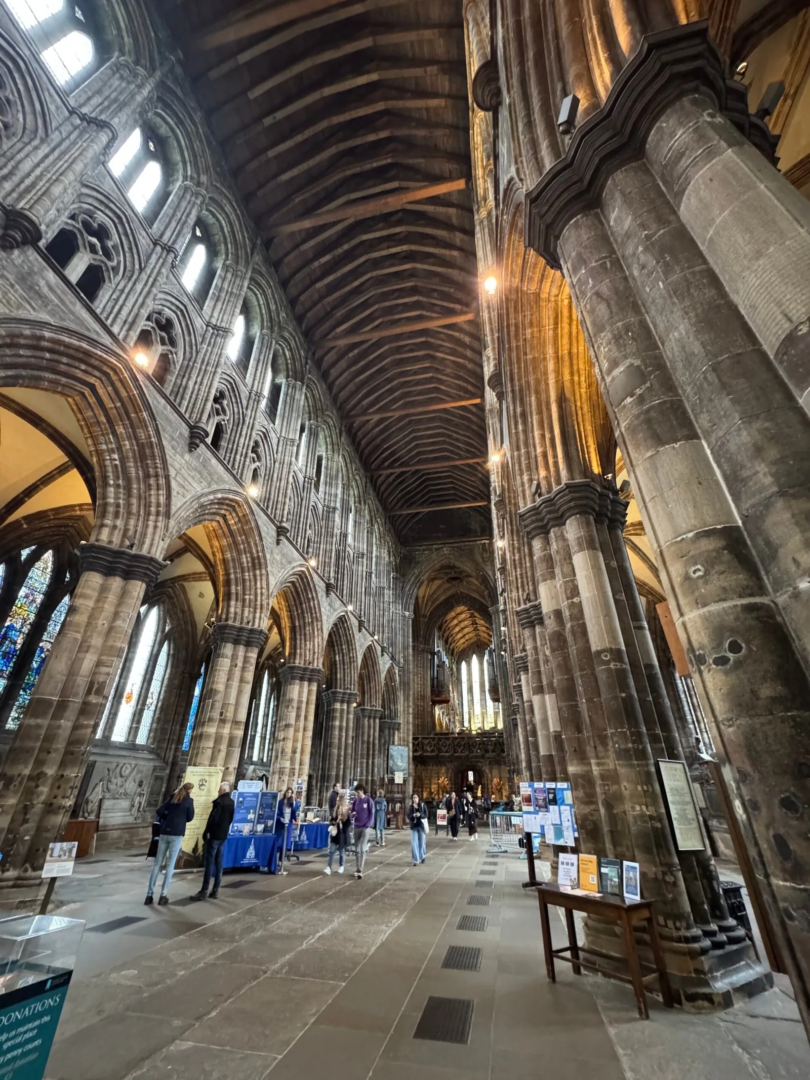 Large stone columns inside the cathedral holding up the high ceiling