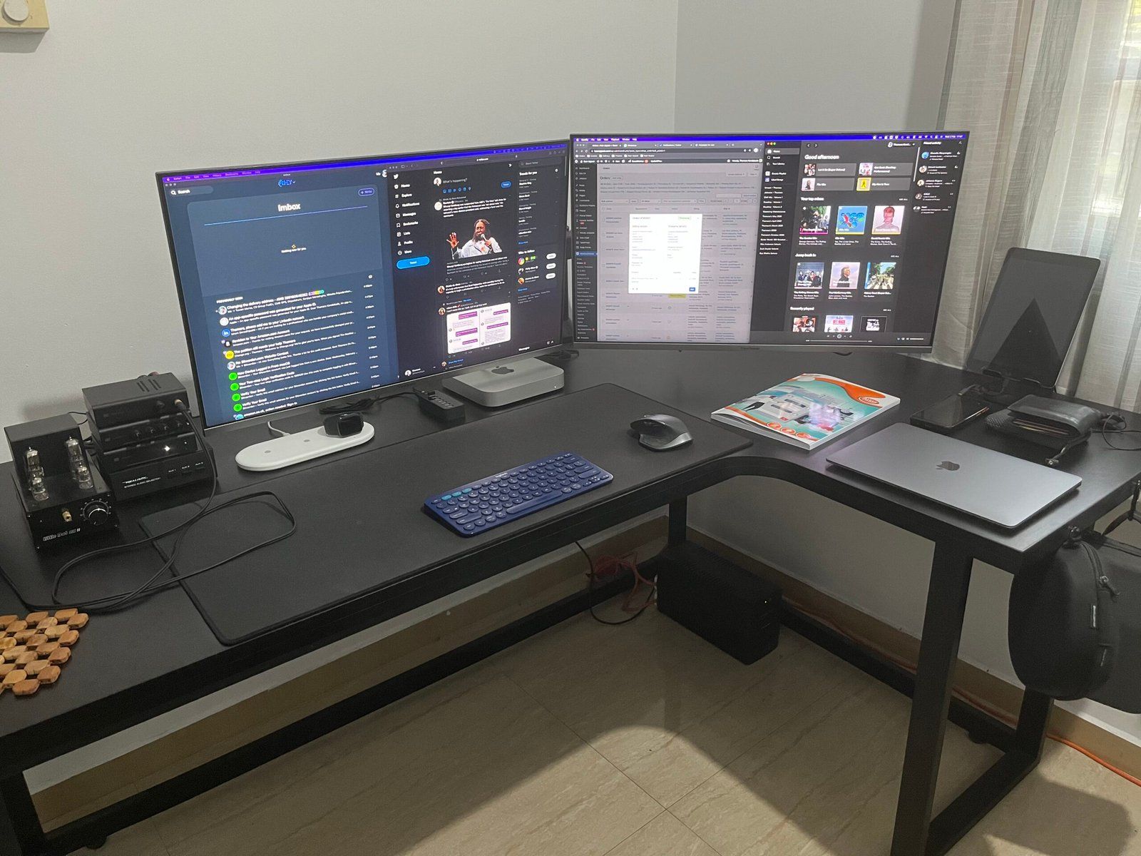 Desk setup featuring two monitors