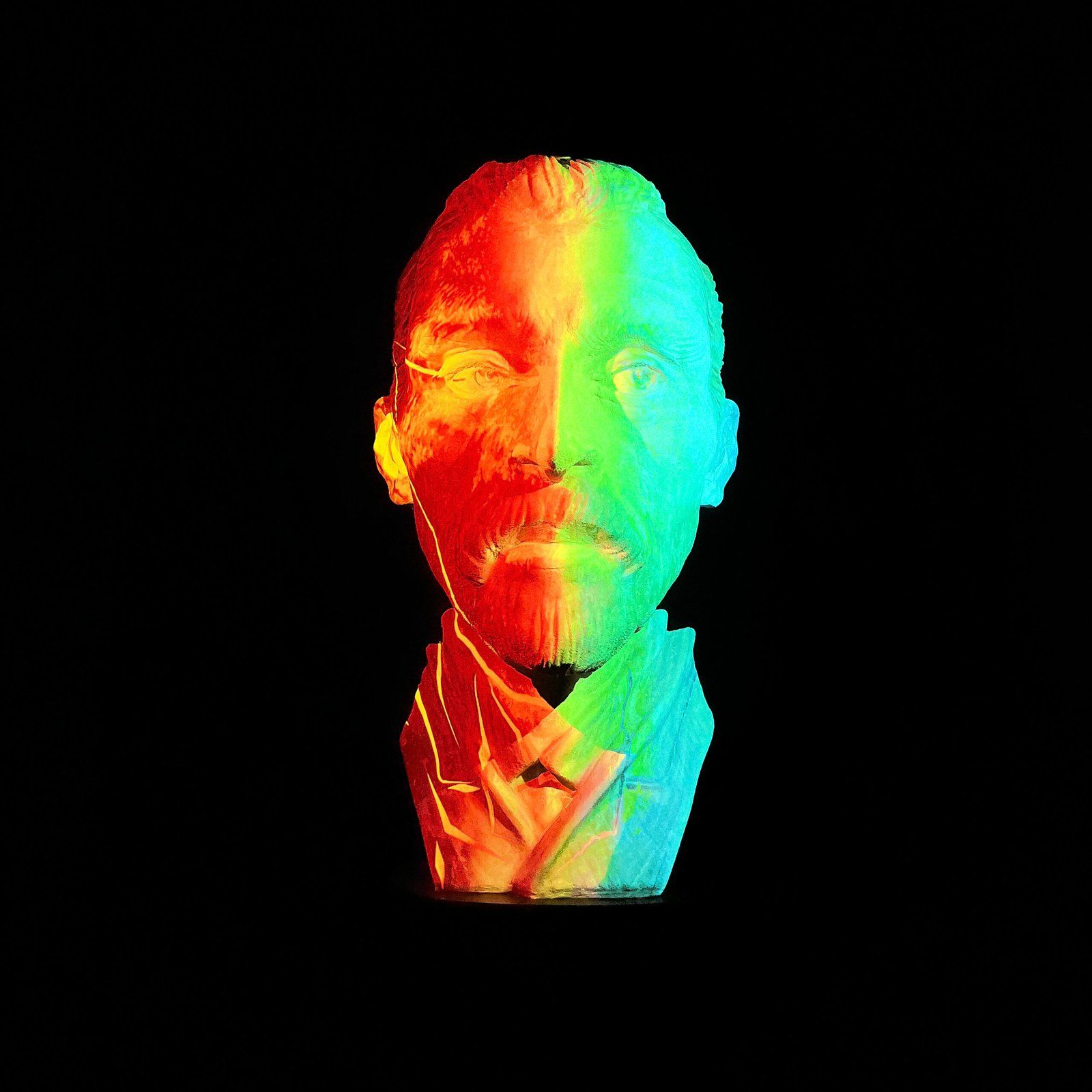 A holographic projection of Vincent van Gogh's face.