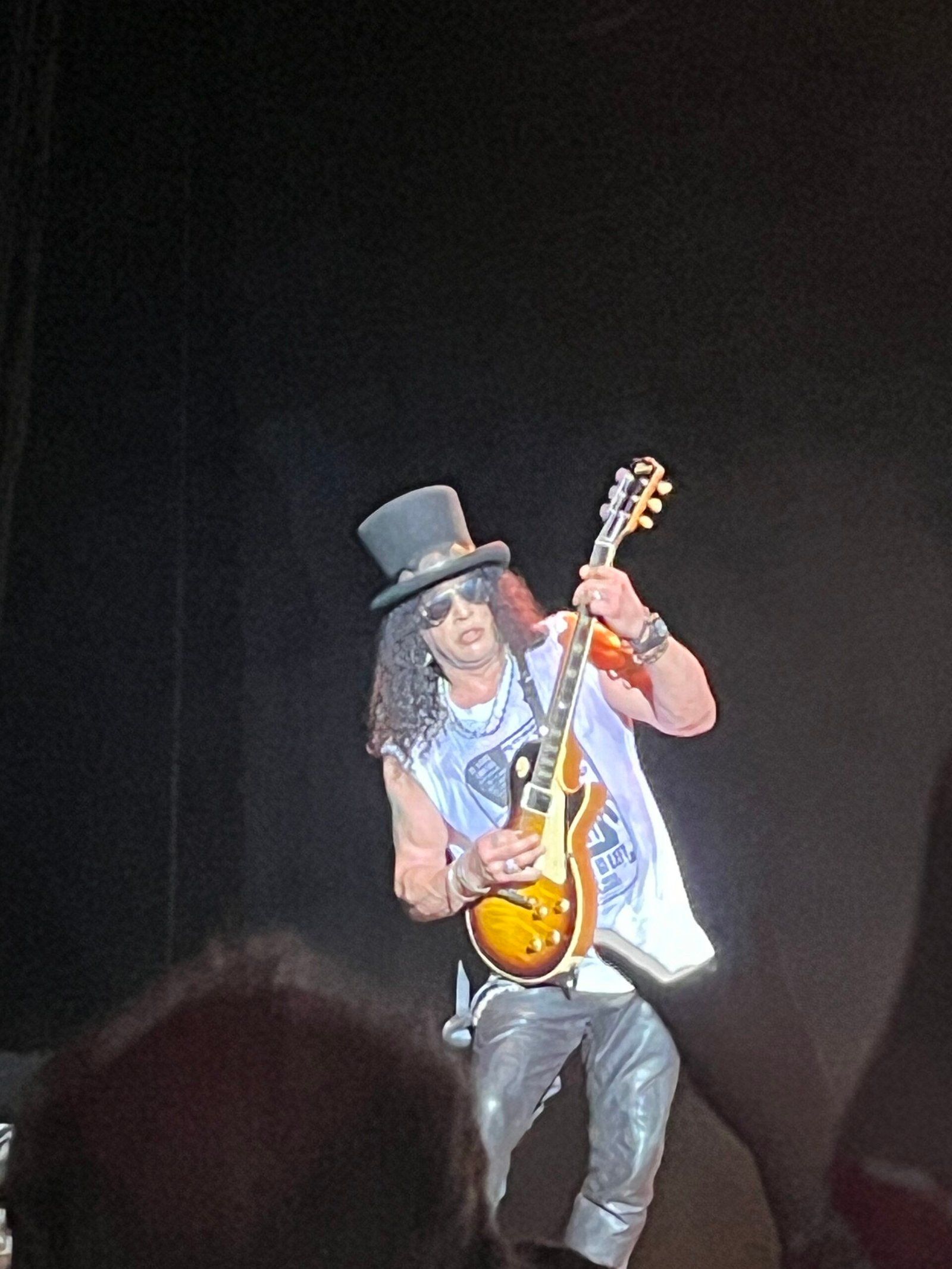 Slash playing a solo on his Les Paul