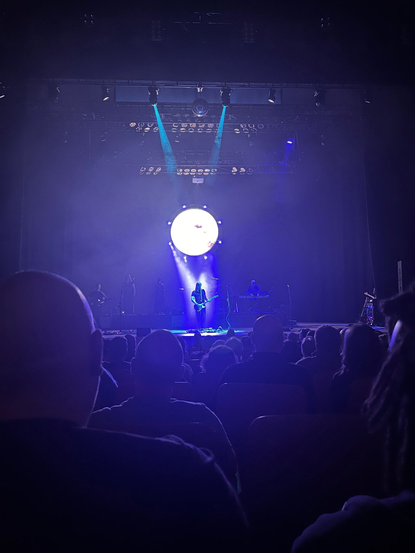 UK Pink Floyd Experience on stage, with the spotlight on guitarist Paul Andrews.