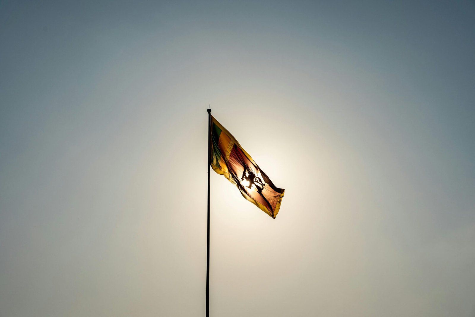 Sri Lankan flag waving against a clear sky