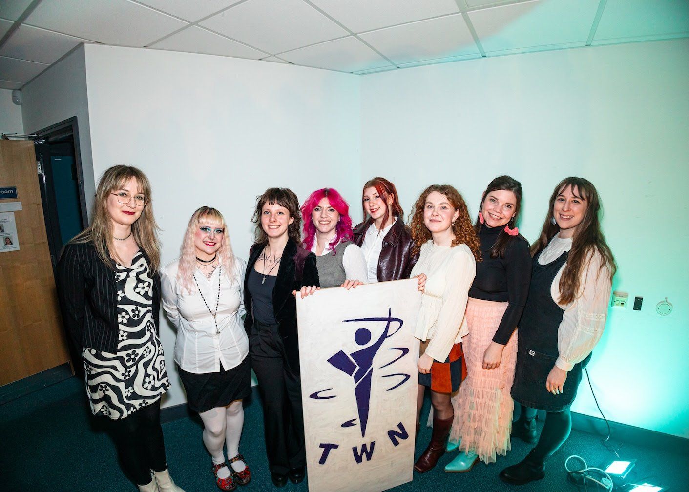 The perfomers posing for a photo